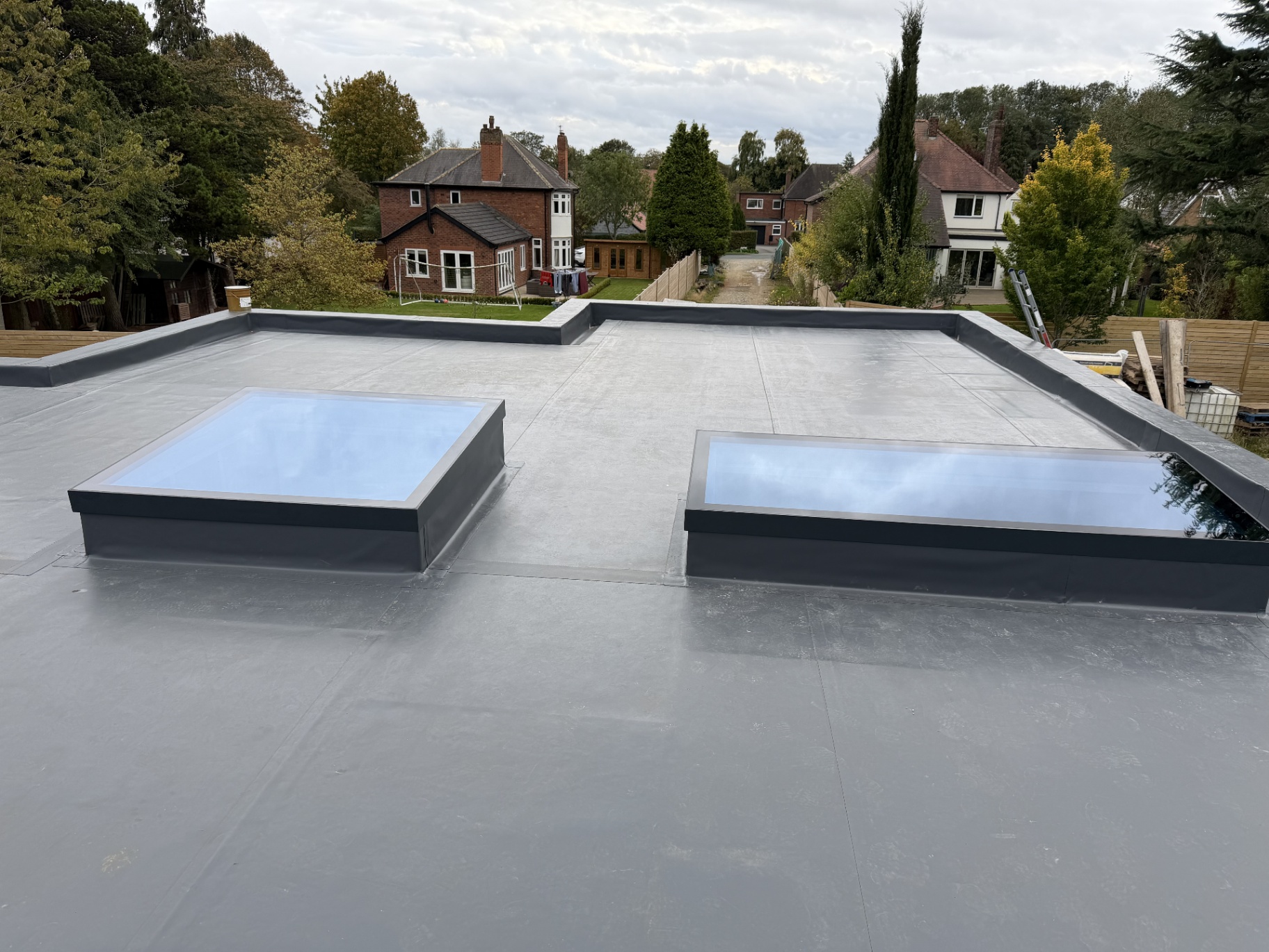 Infinity flat rooflight above a living room